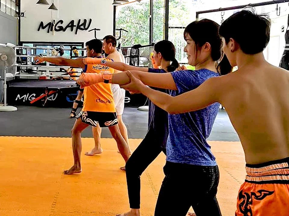 A group Muay Thai training session at Migaku in Bangkok