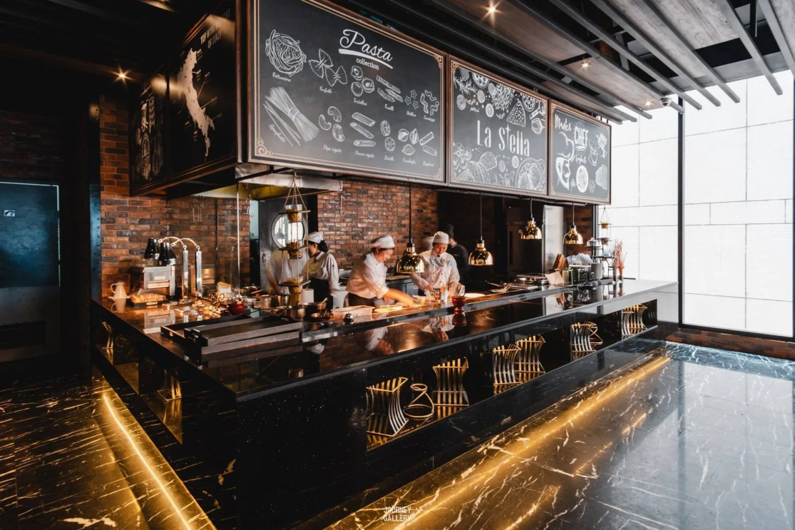 PRIME restaurant open kitchen with chefs at work